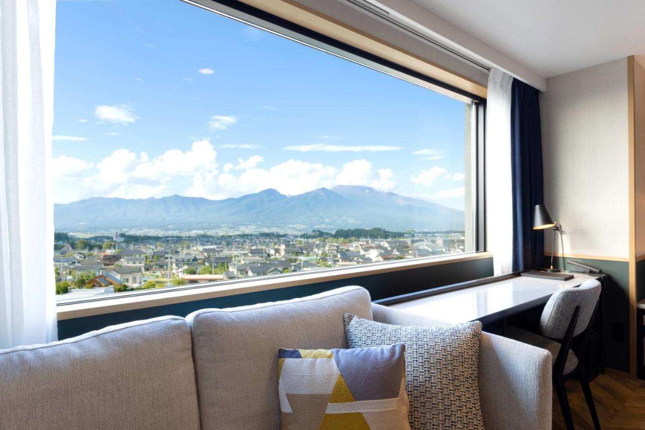 Aqa Hotel Premium Saku Buitenkant foto