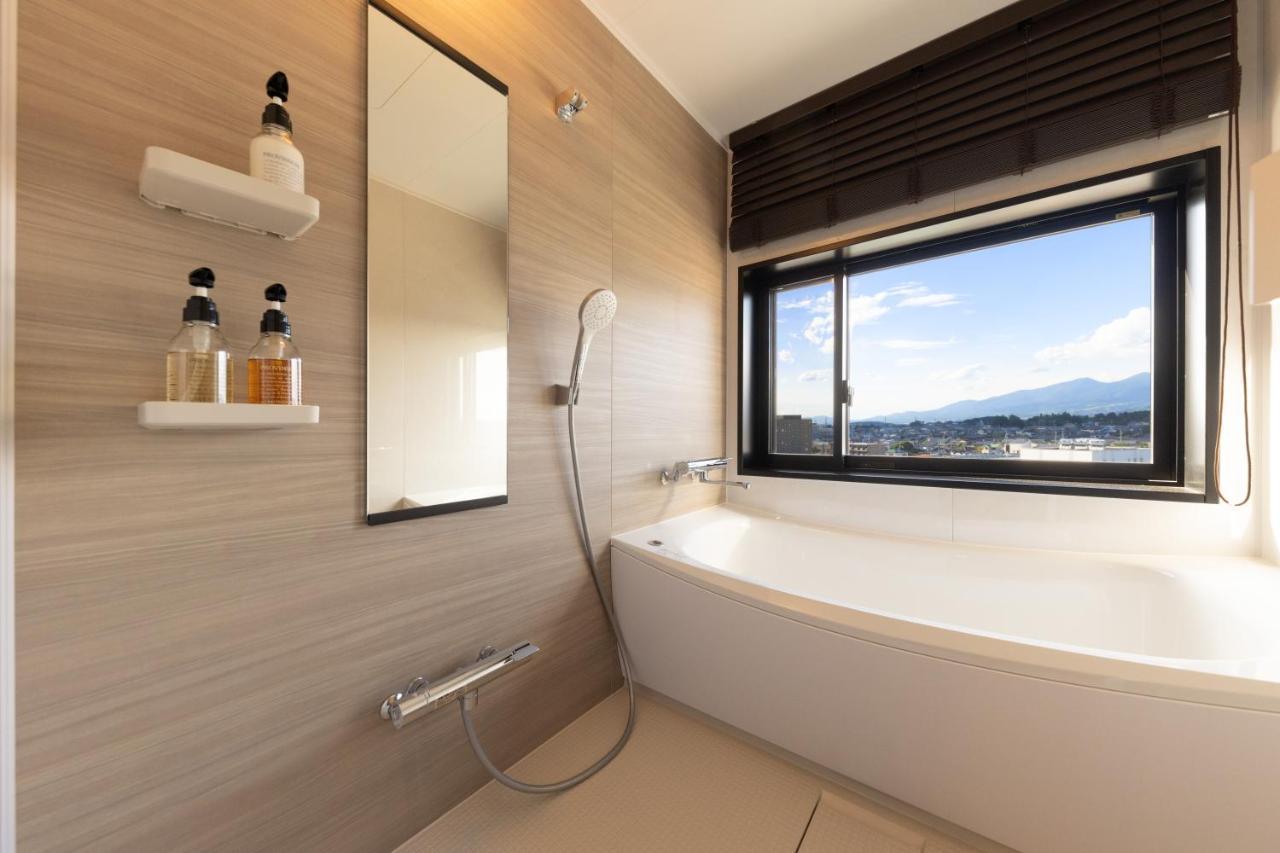 Aqa Hotel Premium Saku Buitenkant foto
